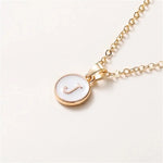 Load image into Gallery viewer, Gold Accented Circle Letter Initial Necklace
