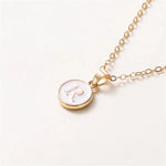 Load image into Gallery viewer, Gold Accented Circle Letter Initial Necklace
