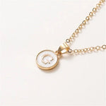 Load image into Gallery viewer, Gold Accented Circle Letter Initial Necklace
