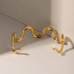 Load image into Gallery viewer, Gold Wavy Statement Bracelet and Necklace
