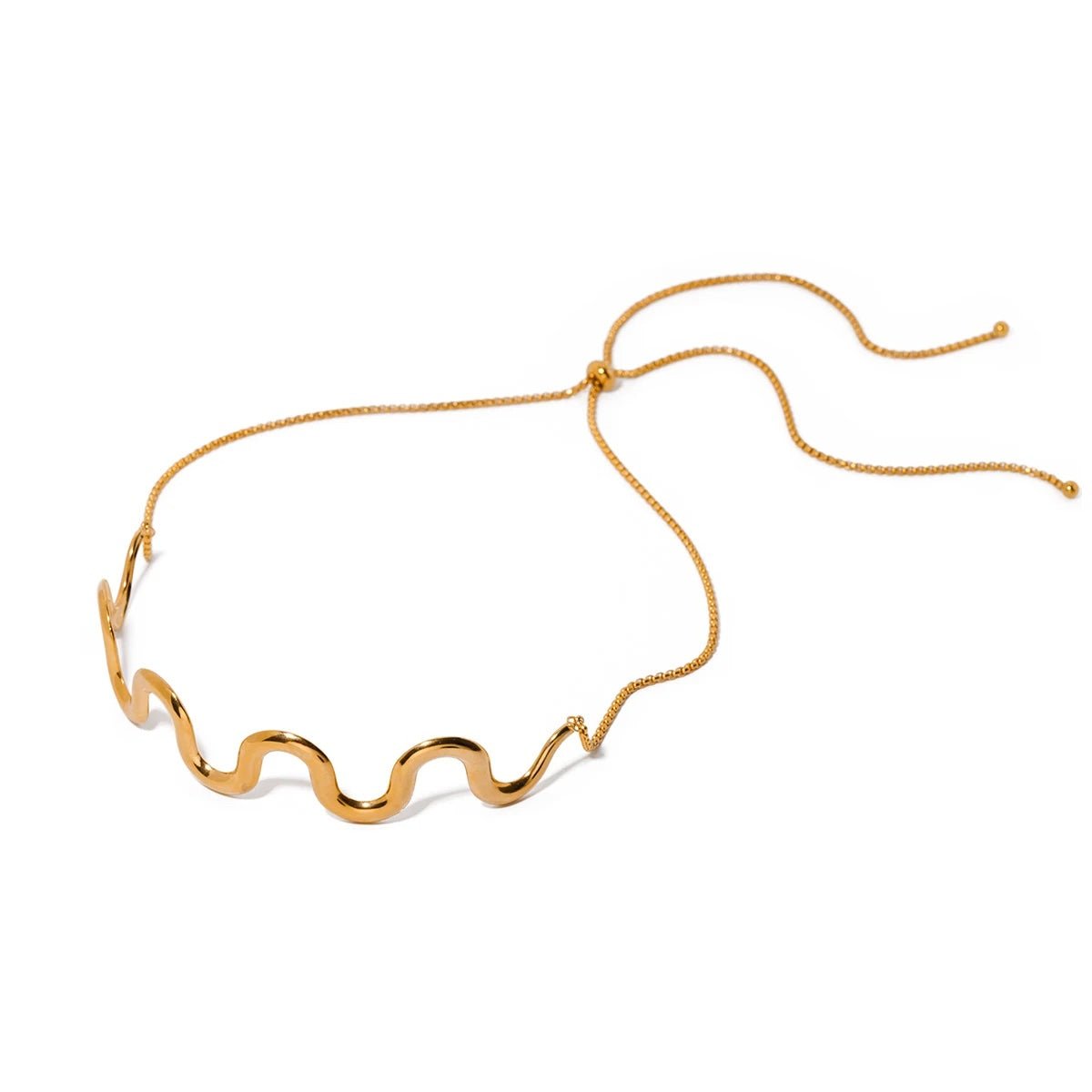 Gold wavy statement bracelet and necklace