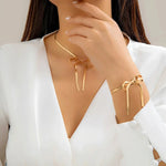 Load image into Gallery viewer, Herringbone Chain Bow Necklace and Bracelet Set
