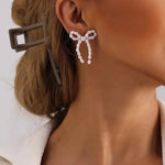 Load image into Gallery viewer, Iconic Dainty Pearl Bow Earrings
