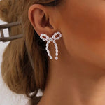 Load image into Gallery viewer, Iconic Dainty Pearl Bow Earrings
