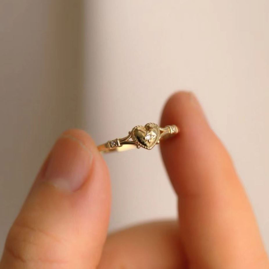 Heart ring with dainty crystal design in gold