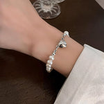 Load image into Gallery viewer, Magnetic Heart Pearl Choker Necklace and Bracelet
