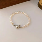 Load image into Gallery viewer, Magnetic Heart Pearl Choker Necklace and Bracelet

