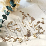 Load image into Gallery viewer, Minimal Accented Pearl Letter Initial Necklace
