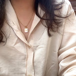 Load image into Gallery viewer, Minimal Accented Pearl Letter Initial Necklace

