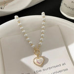 Load image into Gallery viewer, Pearl Heart Clasp Choker Necklace

