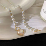 Load image into Gallery viewer, Pearl Heart Clasp Choker Necklace
