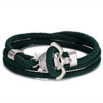 Load image into Gallery viewer, Elegant Sea Turtle Bracelet green braided bracelet with silver anchor clasp displayed on a white background.
