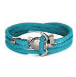 Load image into Gallery viewer, Elegant Sea Turtle Bracelet turquoise braided bracelet with silver turtle and anchor charms displayed on a white background.
