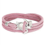 Load image into Gallery viewer, Elegant Sea Turtle Bracelet pink braided bracelet with silver anchor clasp displayed on a white background.
