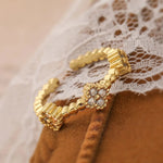 Load image into Gallery viewer, Resizable Trio Textured Floral Rings

