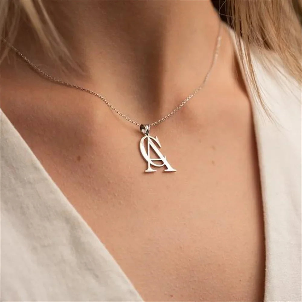 The interlocking cipher pendant necklace