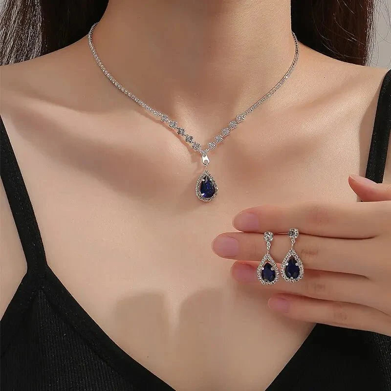 Shimmering blue teardrop diamond necklace and earrings set 780787