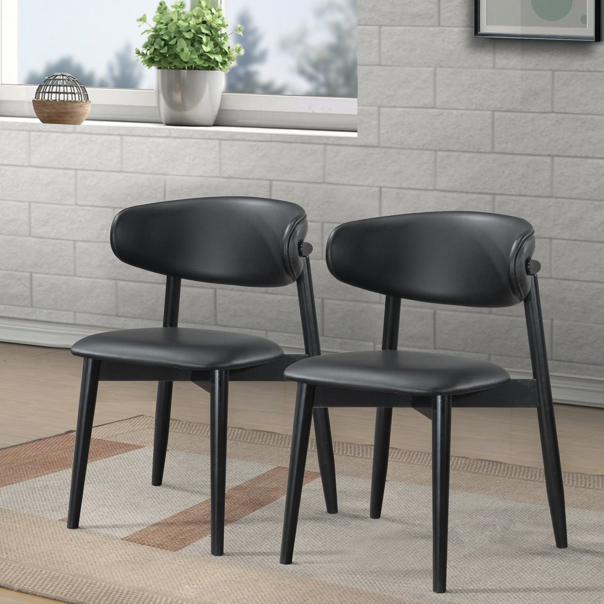 THE FURNITURE CO. Luxury Black Vegan Leather Dining Chairs for Elegant Dining Spaces
