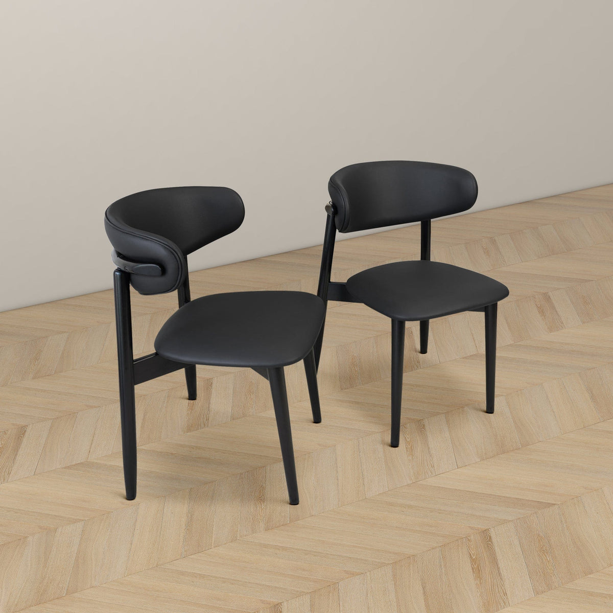 THE FURNITURE CO. Luxury Black Vegan Leather Dining Chairs for Elegant Dining Spaces