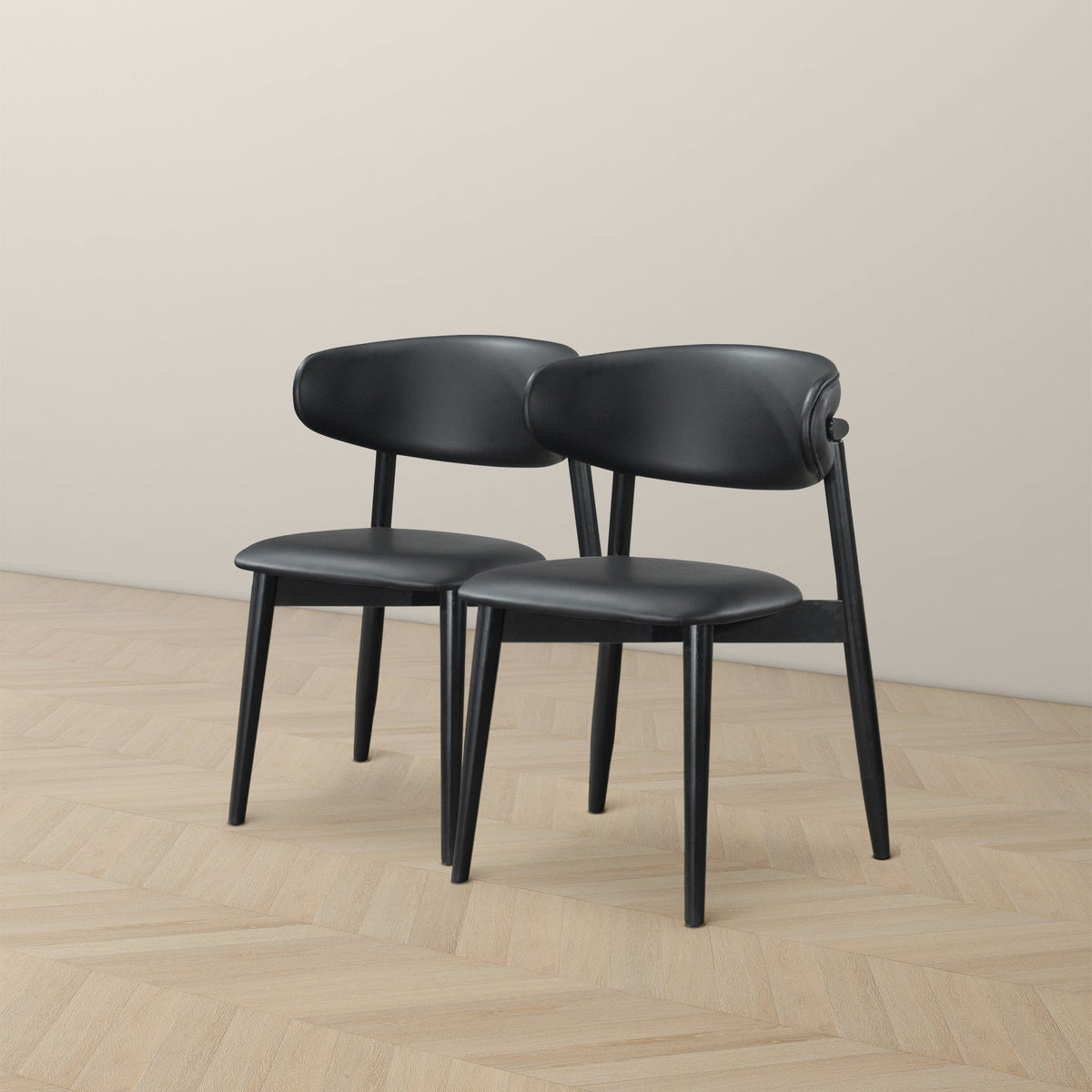 THE FURNITURE CO. Luxury Black Vegan Leather Dining Chairs for Elegant Dining Spaces