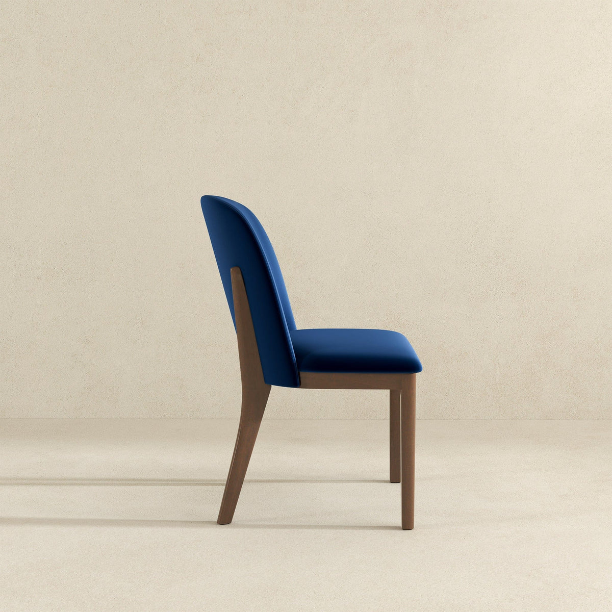 THE FURNITURE CO. Luxury Navy Blue Velvet Dining Chairs for Elegant Dining Spaces.