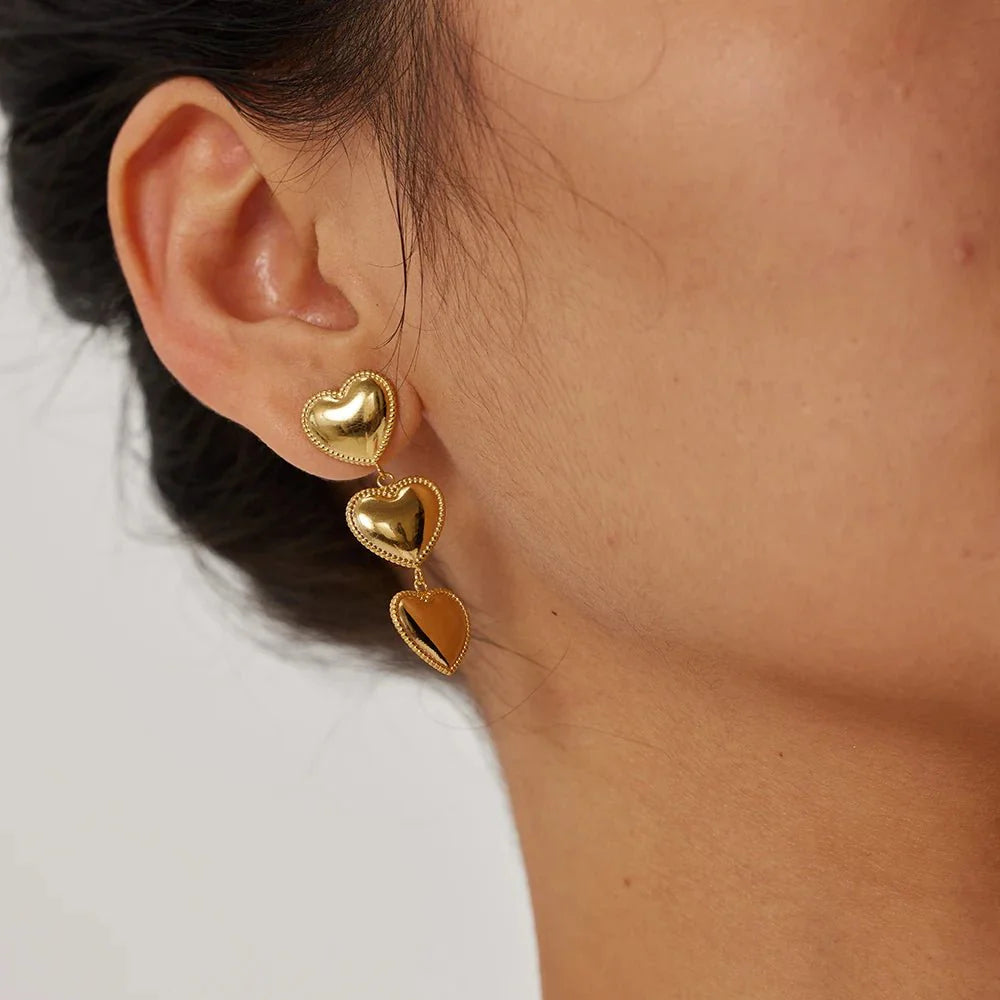 Triple hearts drop earrings
