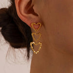 Load image into Gallery viewer, Triple Outlined Hearts Drop Earrings
