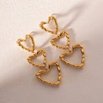 Load image into Gallery viewer, Triple Outlined Hearts Drop Earrings
