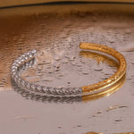 Load image into Gallery viewer, Twisted Half Two Tone Cuff Bracelet
