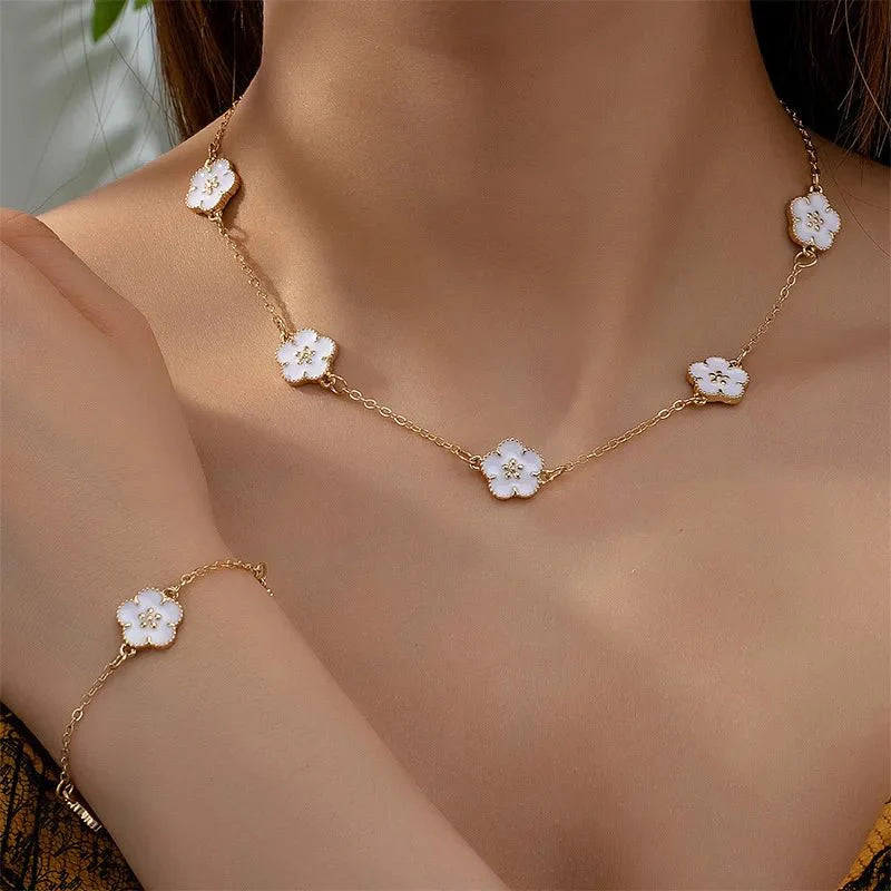White accented clover necklace and bracelet set 122622