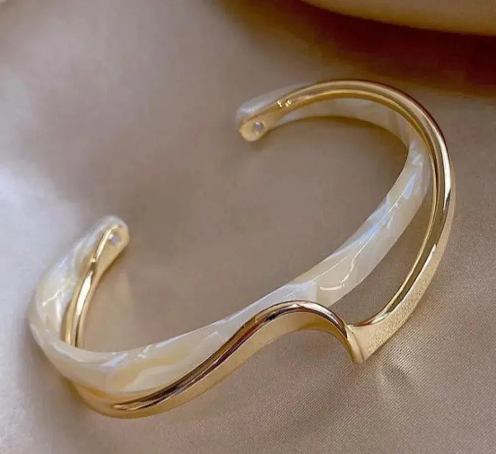 Delicate white opal bracelet in gold
